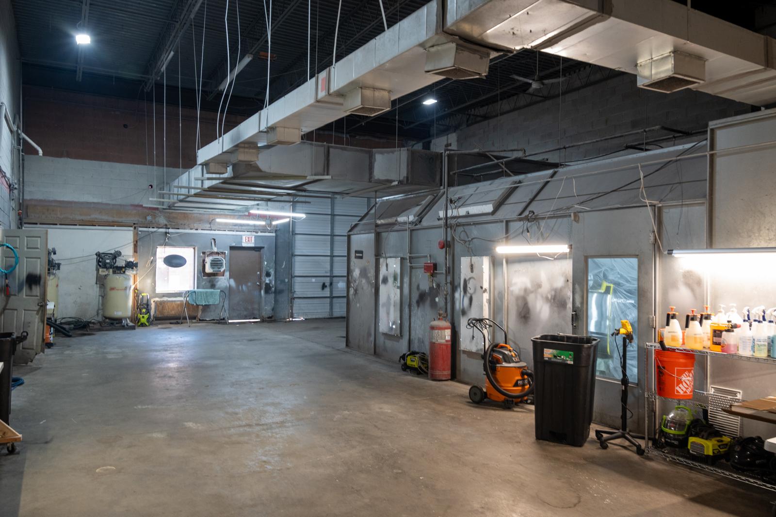 The paint booth and prep area at OZ