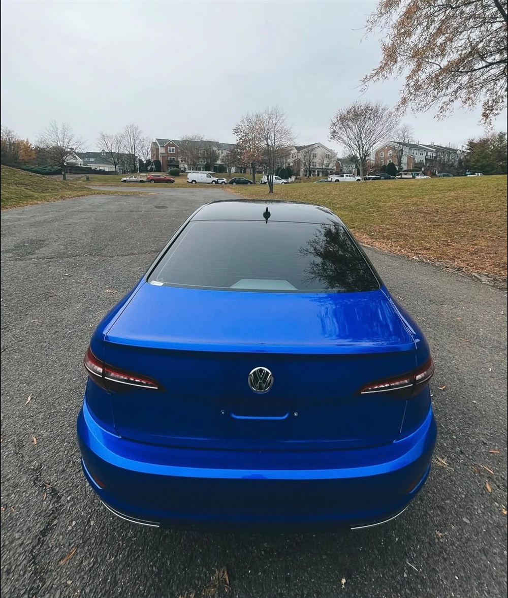 Bright blue Volkswagen Jetta seen from the rear
